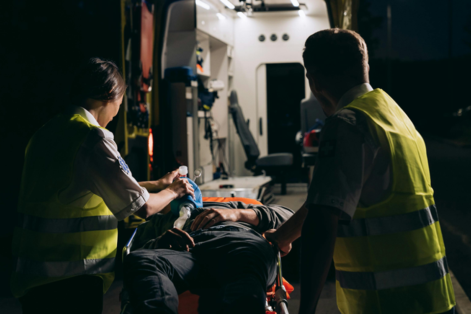 EMTs working on victim