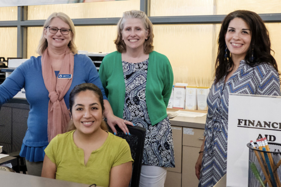 Four women enrollment center team