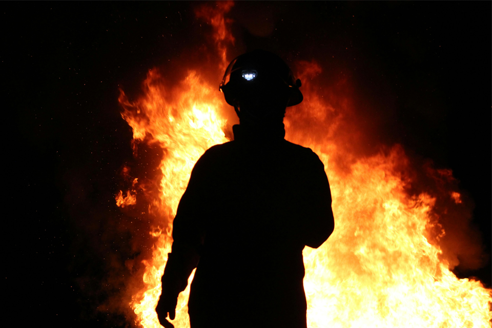 firefighter shadow in a fire