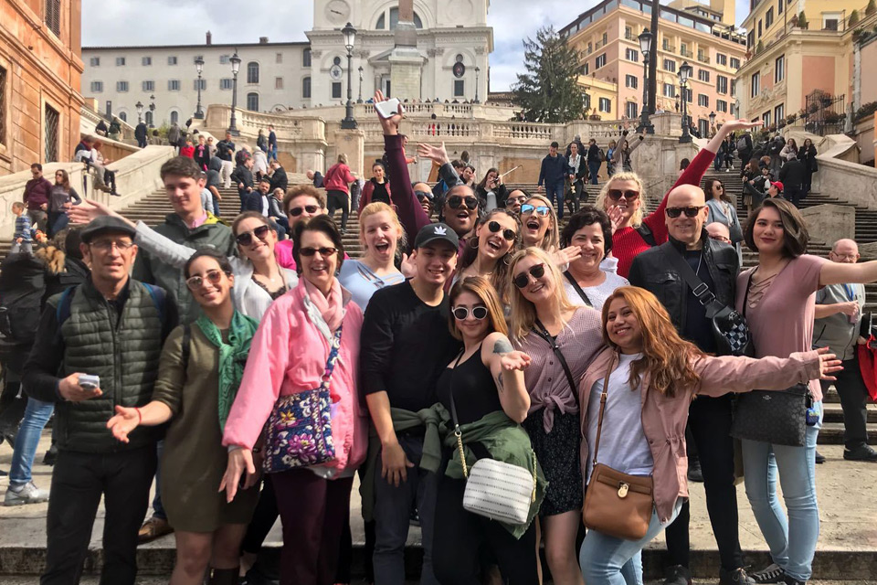 Students standing on steps in Italy