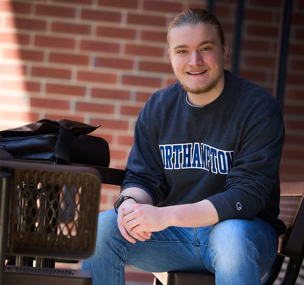 Student sitting at table